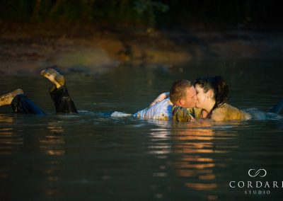 couple making out in mud