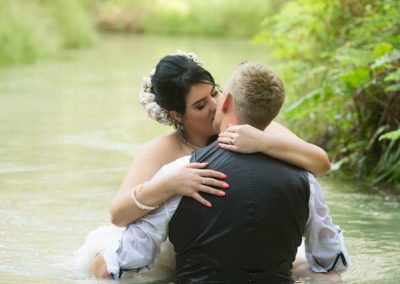 Bride and Groom in stream